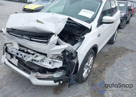 2016 Ford Escape Titanium из США, поврежденный, VIN 1FMCU0J95GUC19159